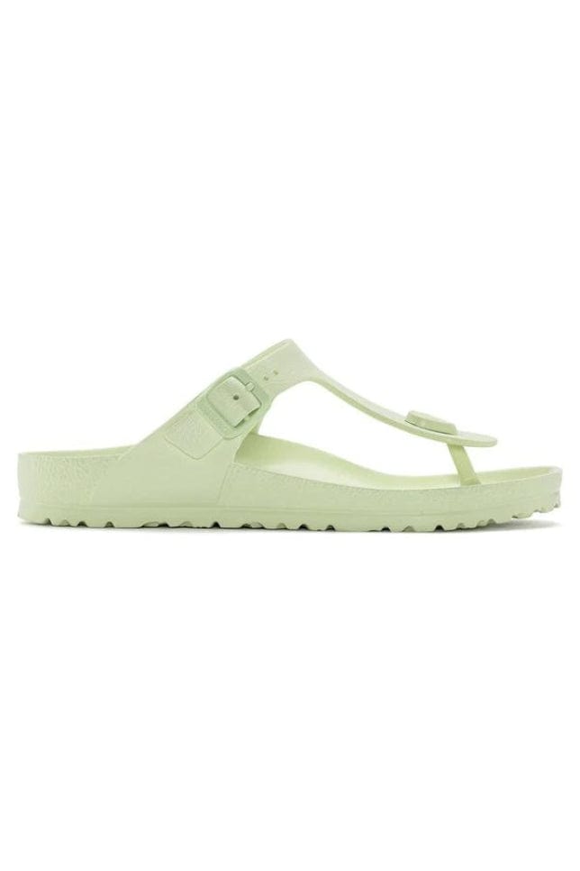 side profile lime green T style sandal with side buckle made from a light weight rubber
