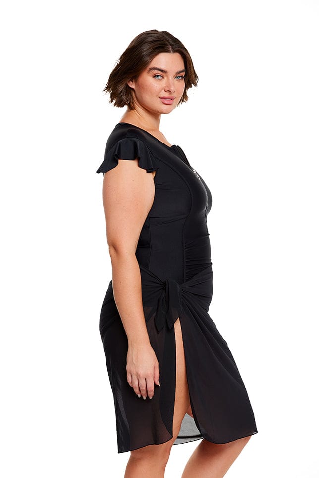 brunette model wears lightweight black mesh skirt
