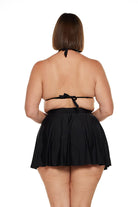 Brunette model wears high waisted swim skirt in black