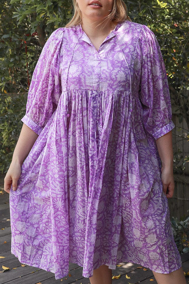 Close up of model wearing Lilac Midi Floaty floral Dress 