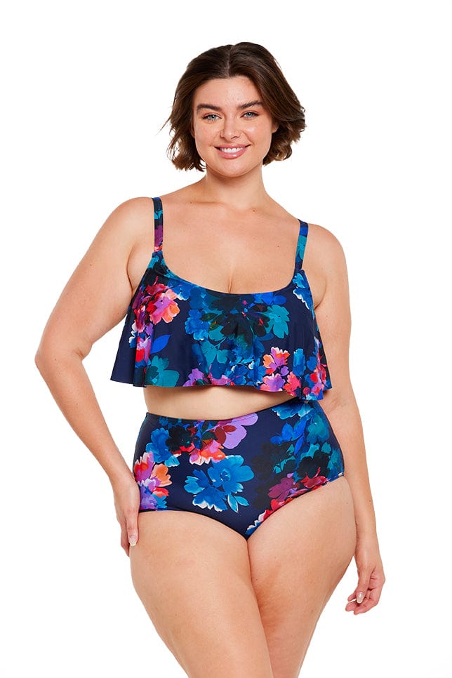 Brunette model wear navy floral frill bikini top and high waisted bottom