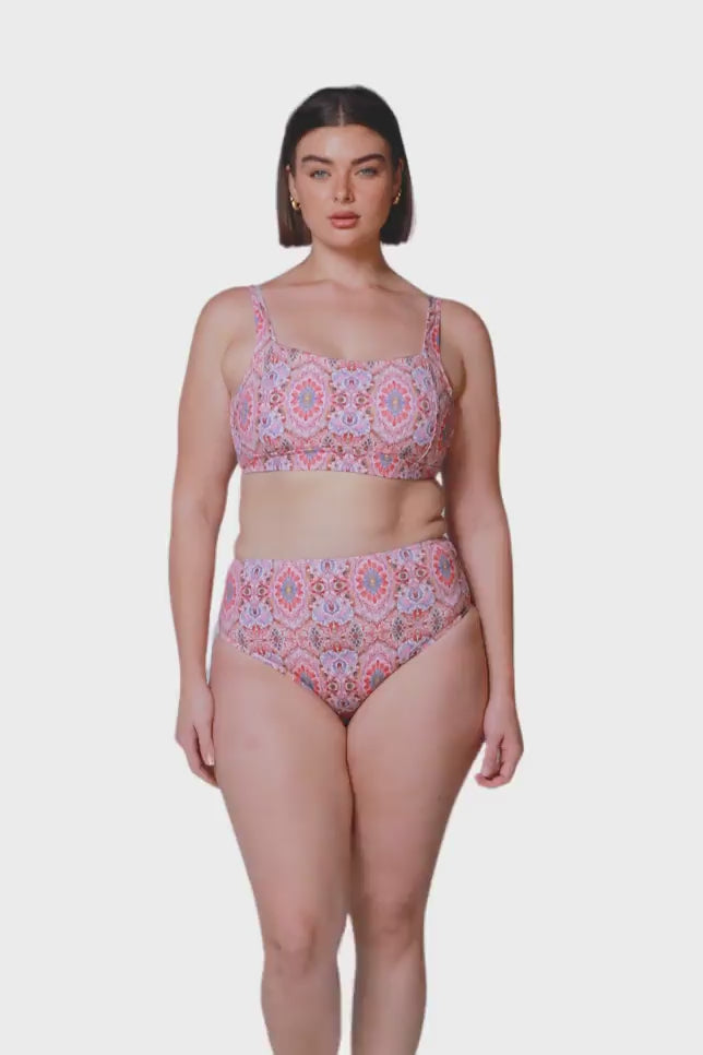 product video of brunette size 14 model wearing square neck bikini in mosaic pink print