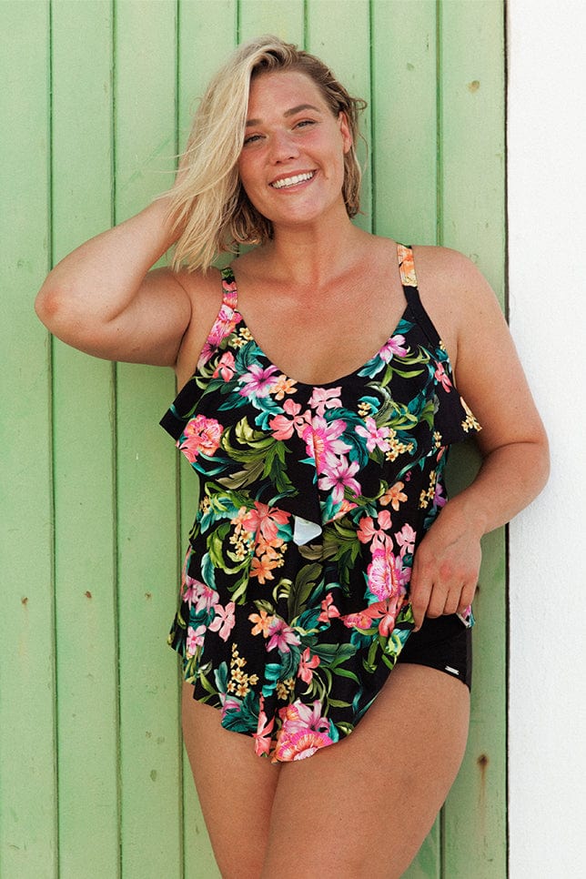 blonde plus size women wearing 3 tier ruffle tankini top in green and pink floral print