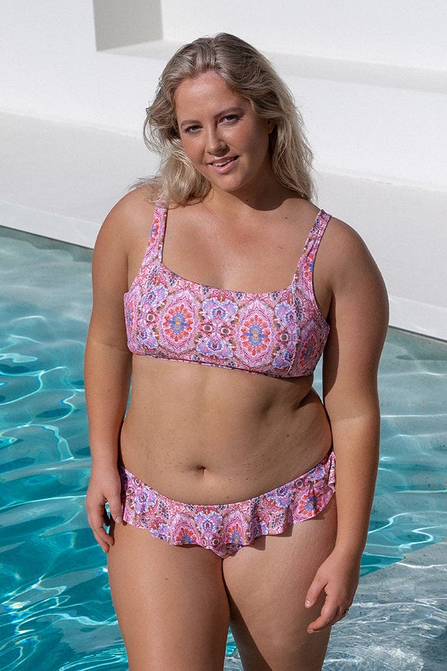blonde women wearing cute square neckline bikini top in pink