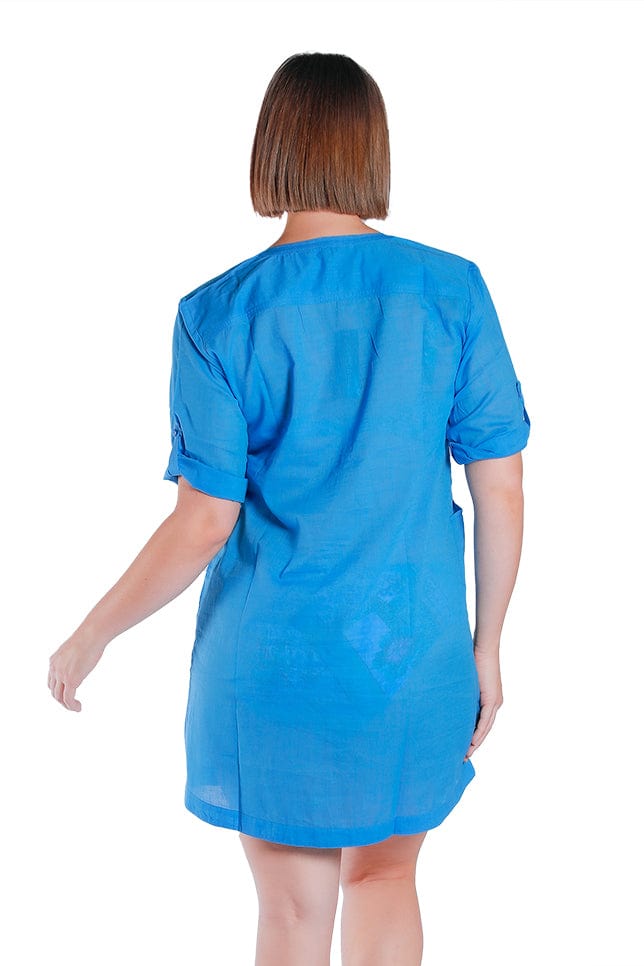 brunette model wears blue kaftan with adjustable sleeves